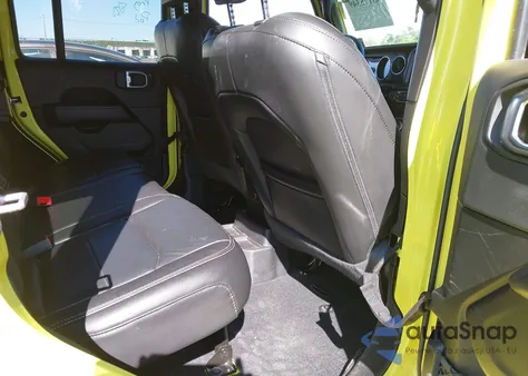 2023 Jeep Wrangler 4-Door Sahara 4X4 from USA, damaged, VIN 1C4HJXEG8PW570737